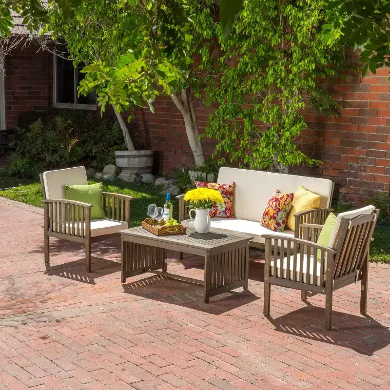 Conjunto de conversación para 4 personas Navan de Christopher Knight Home, de madera de acacia para exterior, con cojín resistente al agua