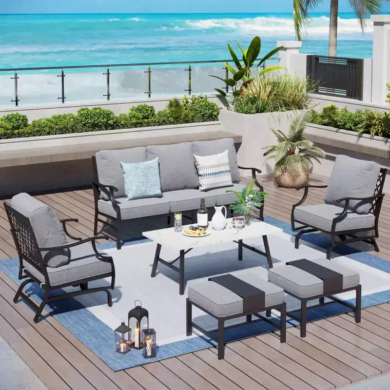 Captiva Designs 6-teiliges Outdoor-Sitzset aus Metall für die Terrasse mit Schaukelstühlen mit Gitterlehne, Hockern und Couchtisch