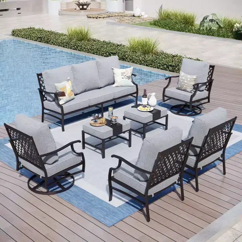 Conjunto de conversación para patio y exteriores de metal de 7 piezas Captiva Designs, con sillas giratorias de respaldo de rejilla y otomanas para jardín, junto a la piscina o patio trasero