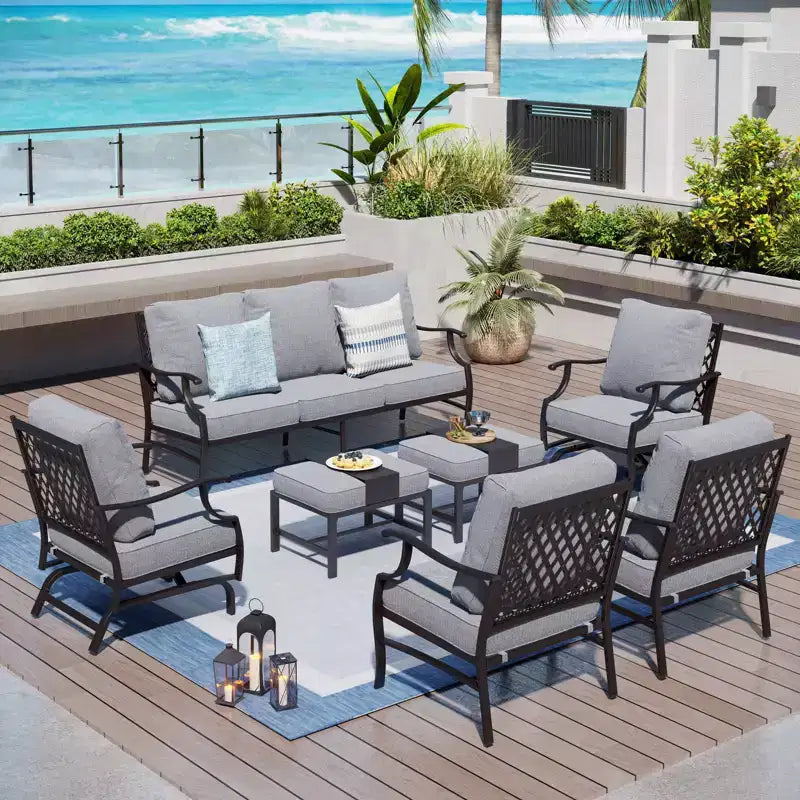 Captiva Designs 7-teiliges Outdoor-Unterhaltungsset aus Metall für die Terrasse mit Schaukelstühlen mit Gitterrücken und Hockern für Garten, Poolbereich und Hinterhof