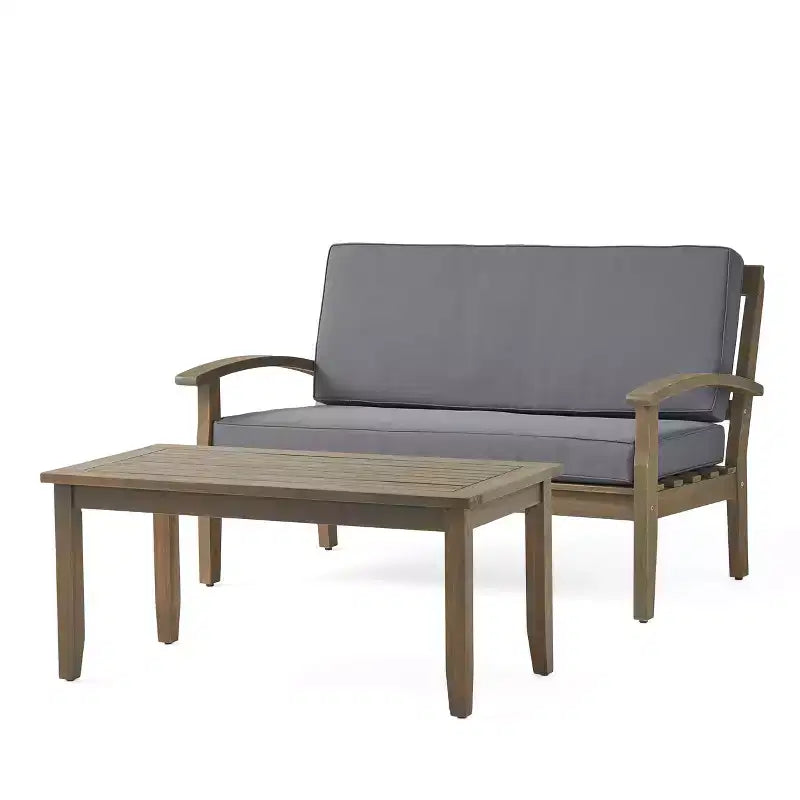 Ensemble GDFStudio Keanu d’extérieur en bois d’acacia avec causeuse et table basse, coussins inclus