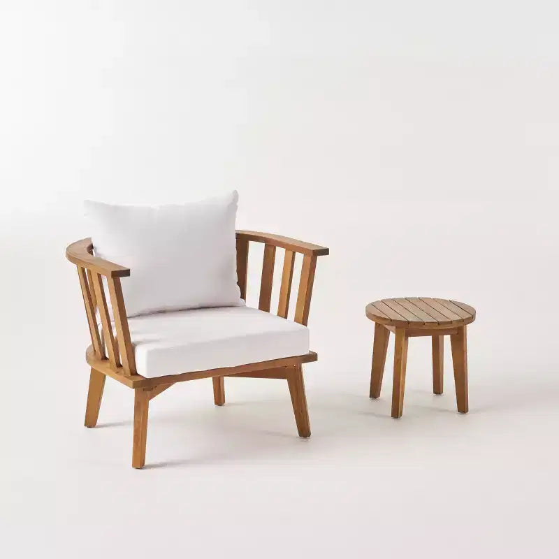 Conjunto GDFStudio Lorie de sillón y mesa auxiliar de madera de acacia para exterior con cojines, color teca/blanco
