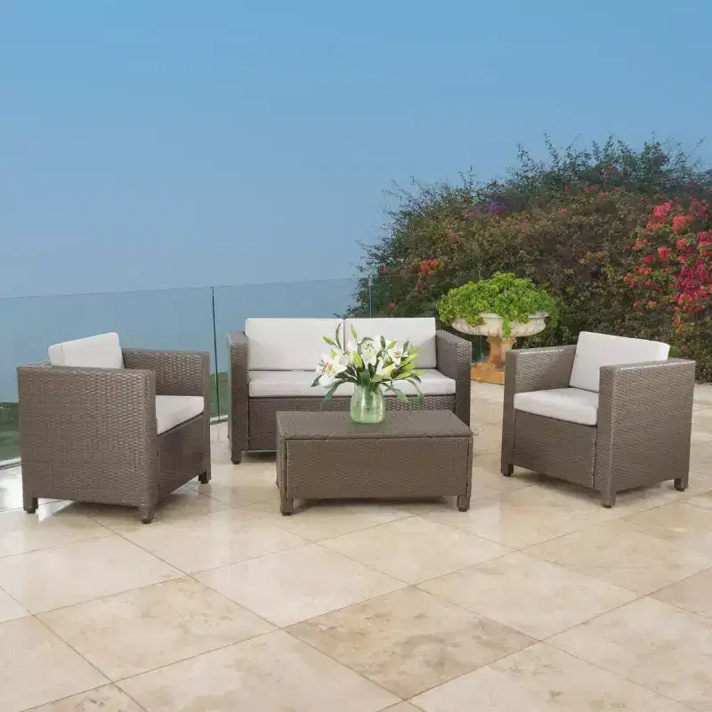 Conjunto de conversación de mimbre para exterior Christopher Knight Home Puerta de 4 plazas, con cojines