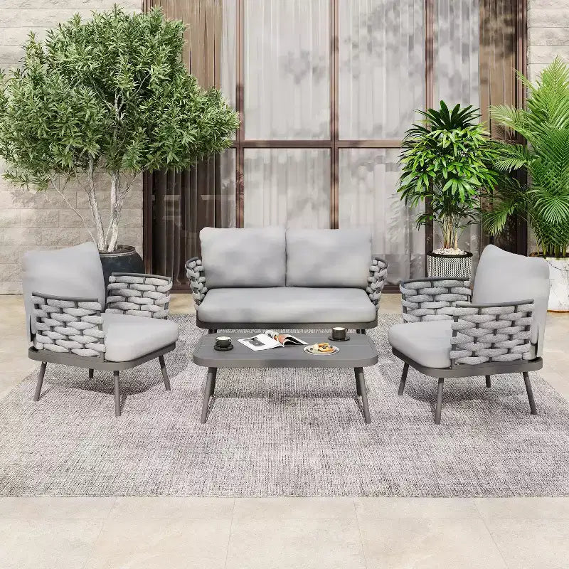 Ensemble de salon de jardin moderne 4 pièces Belle de Christopher Knight Home, en métal et corde rembourrée, avec table basse