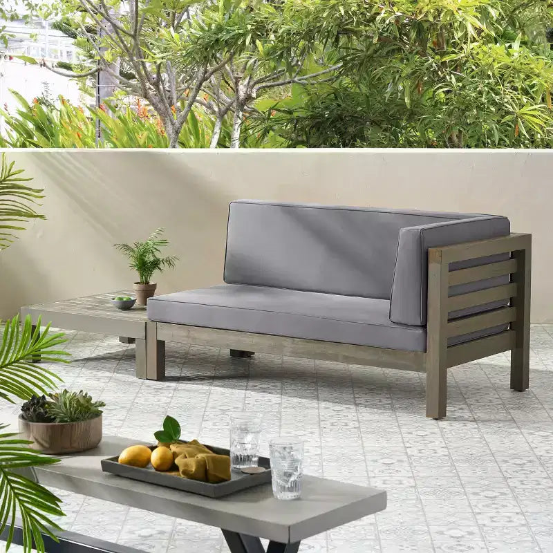 Christopher Knight Home Oana conjunto de sofá biplaza con brazo derecho para exteriores, de madera de acacia, y mesa de centro, con cojín