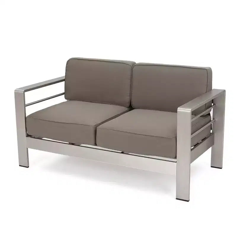 Ensemble GDFStudio Martha d'extérieur avec causeuse en aluminium et table basse, avec coussins