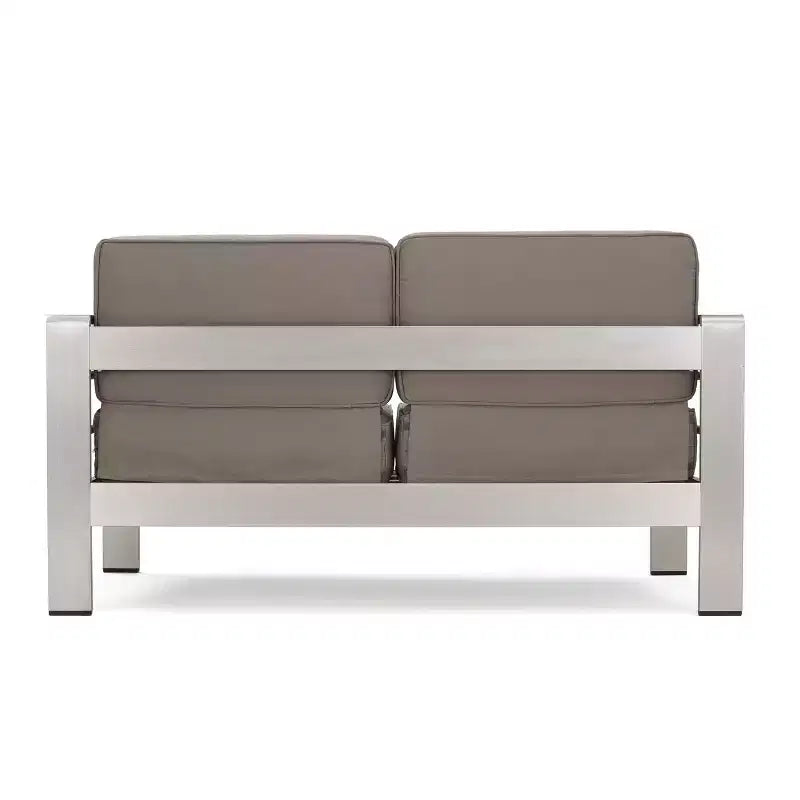 Ensemble GDFStudio Martha d'extérieur avec causeuse en aluminium et table basse, avec coussins