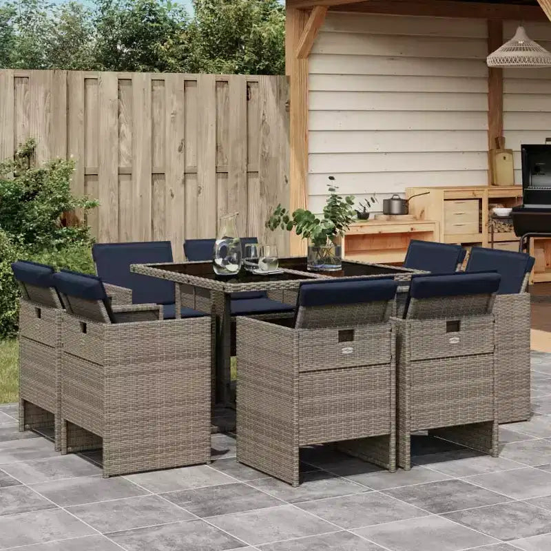 Conjunto de comedor para patio vidaXL de 8 piezas, mesa de comedor exterior de ratán gris y sillas con cojines azul marino