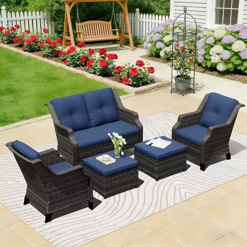 Conjunto de sala de exterior UPTIOT con sofá de dos plazas, sillas y otomana