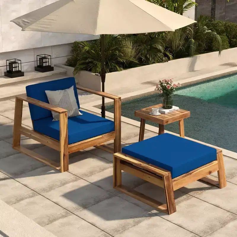 GDFStudio Camille conjunto de silla de descanso y otomana para exteriores de madera de acacia con cojines