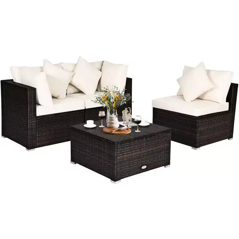 Ensemble de mobilier de patio Costway 4 pièces en résine tressée imitation rotin, avec canapé, coussins et ottoman