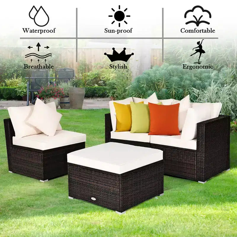 Ensemble de mobilier de patio Costway 4 pièces en résine tressée imitation rotin, avec canapé, coussins et ottoman