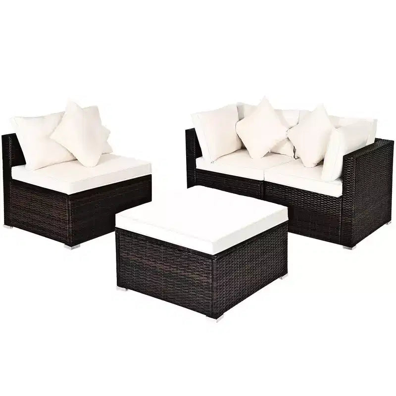 Ensemble de mobilier de patio Costway 4 pièces en résine tressée imitation rotin, avec canapé, coussins et ottoman