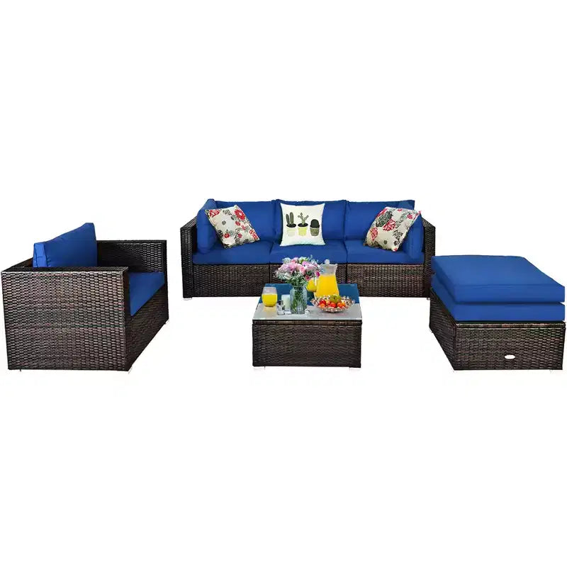 Conjunto de muebles de ratán para patio de 6 piezas de Costway, sofá seccional con cojines, mesa de centro y otomana, azul marino