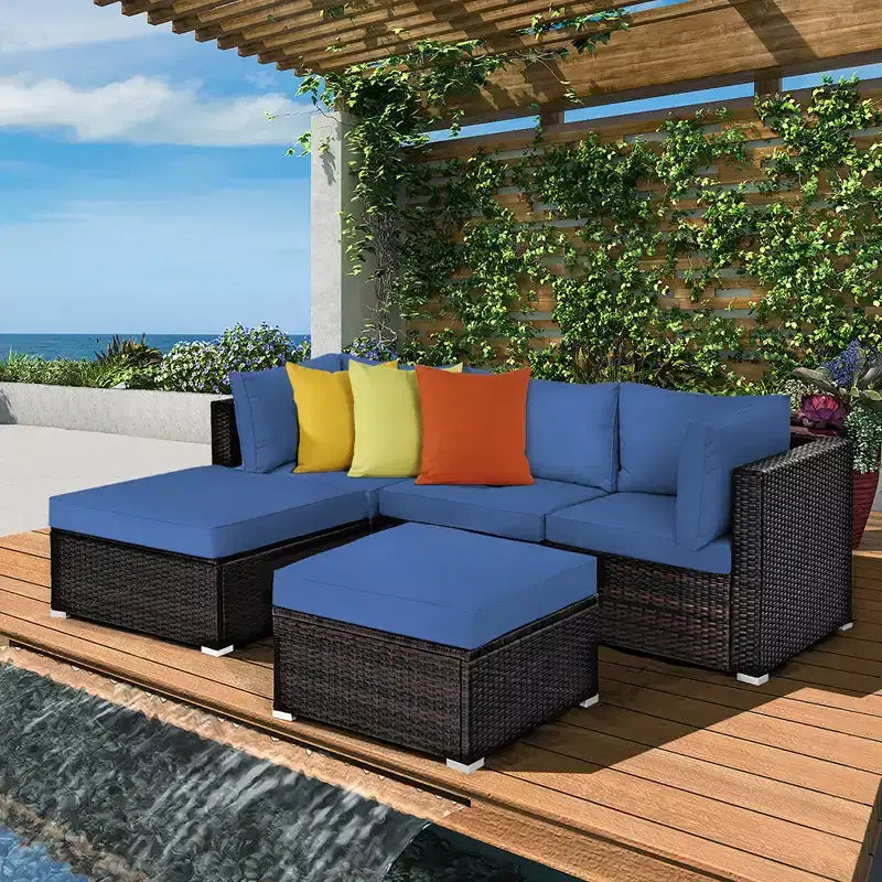 Ensemble de mobilier de terrasse en rotin Costway 5 pièces, ensemble modulable avec pouf, table et coloris bleu marine