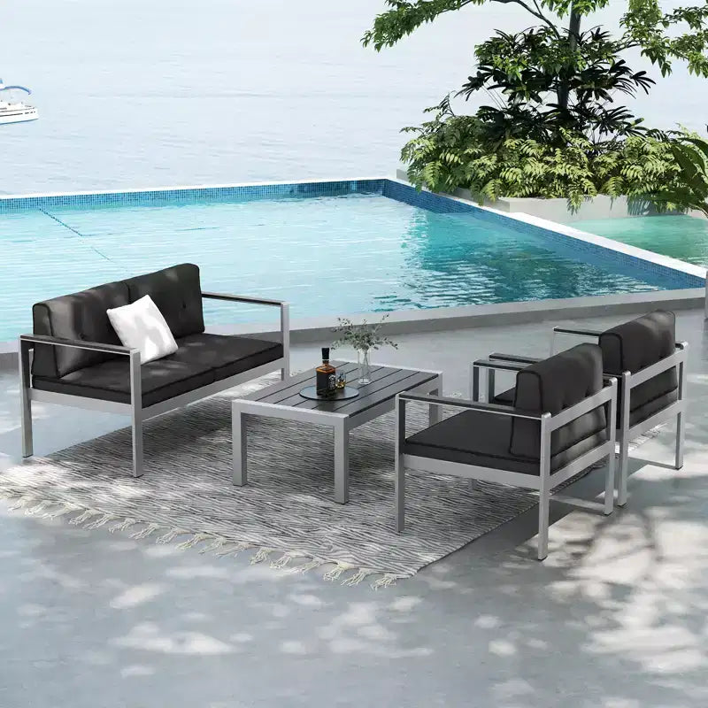 Ensemble de canapé de jardin Costway 4 pièces en aluminium, avec table basse, causeuse, fauteuil rembourré et accoudoirs en WPC
