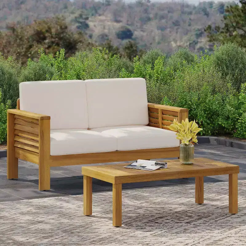 Conjunto de 2 piezas de sofá biplaza y mesa de centro para exterior Louver de Christopher Knight Home, de acacia, con cojines