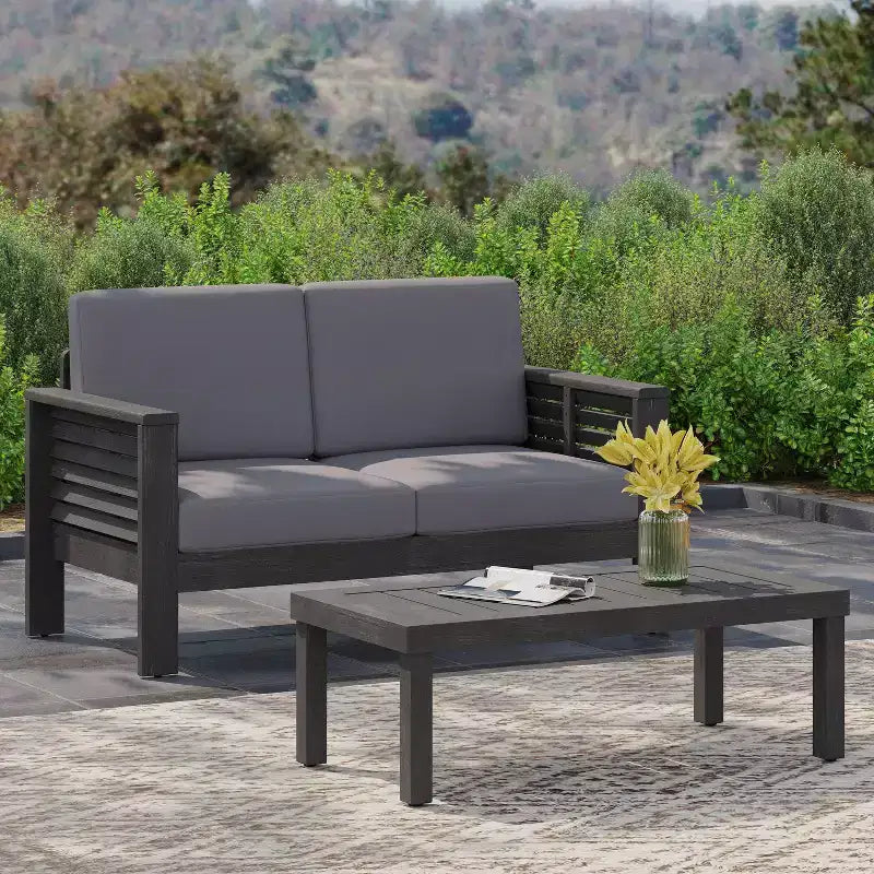 Conjunto de 2 piezas de sofá biplaza y mesa de centro para exterior Louver de Christopher Knight Home, de acacia, con cojines